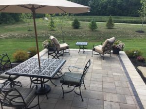 Patio furniture on elevated paver patio