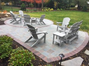 Paver pation with white chairs