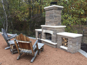 outdoor Wood Burning Fireplace with Crushed stone patio