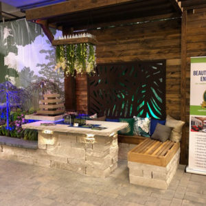Indy Home show display with decorative bench and plants